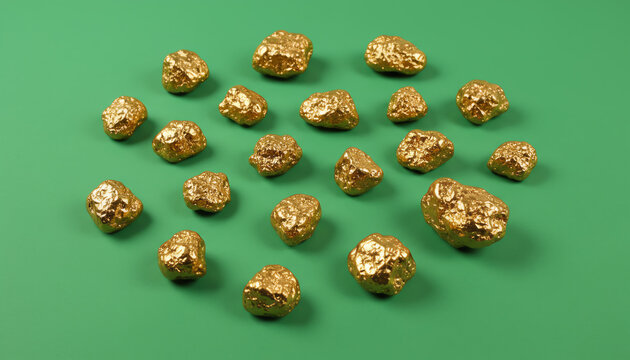 A collection of shiny gold nuggets set against a green background. Perfect representation of wealth, mining, and natural resources. - Powered by Adobe