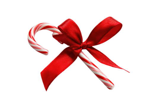 Candy cane with red ribbon bow on a black background