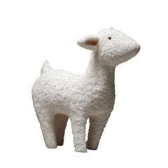 White, textured lamb figurine against a black backdrop