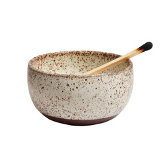 Speckled bowl holding a used matchstick