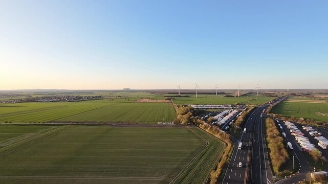 luminous landscape showcasing busy power plants and transit routes, bright aerial perspective highlighting active transportation networks alongside major power generation facilities