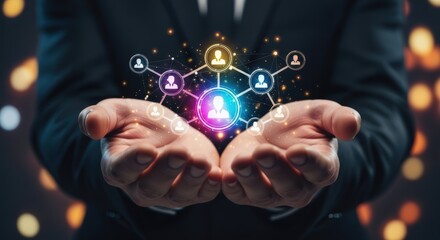 Hands holding interconnected network symbols representing human resources and global business connections with a sparkling bokeh background