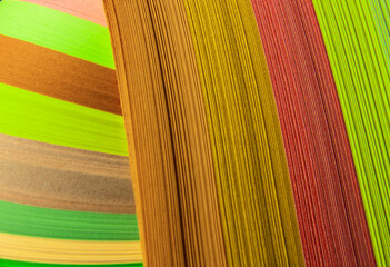 Countless paper stacks, soft curves, colorful hues, various shapes, strong textures, much like ribbons, silk, or lollipops, with ribbons flowing around. fresh