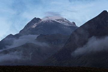 Nevado del Tolima at sunset from the mountains and hills of the p&aacute;ramo. Beautiful view of Los Nevados National Park in the mountains of Colombia.