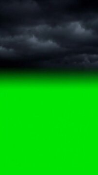 Moody, split screen dark stormy sky over a bright green backdrop