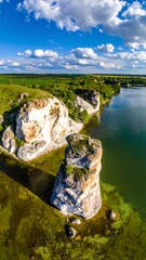 Picturesque Cliffs and Lake Scenery Under a Bright Blue Sky.
