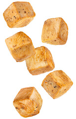 dynamic studio shot of seasoned grilled chicken breast cubes floating in mid-air, isolated on a dramatic transparent background, emphasizing texture and golden brown color.