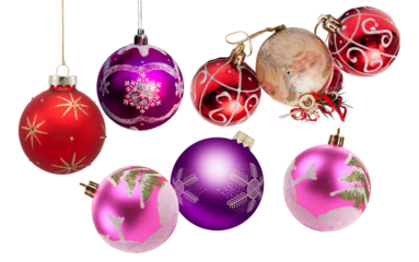collection of sparkling christmas holiday baubles featuring bright festive colors isolated dramatically against a deep transparent background.