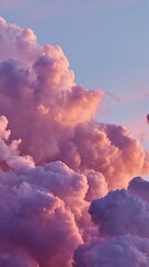 Pink and Purple Clouds at Sunset with Light Blue Sky Background