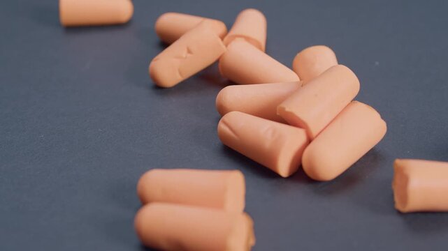 Hear protection earplugs dropped on gray surface