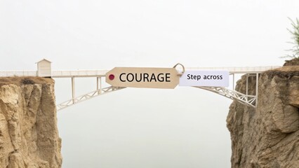 Inspirational bridge symbolizing courage with a sign encouraging the step across a daunting gap in a serene landscape