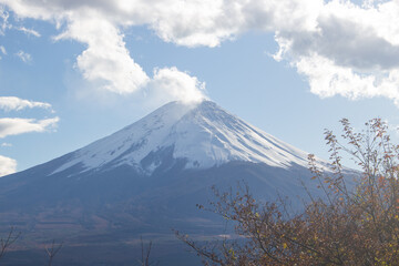 Beautiful landscape of the iconic snow capped Mount Fuji or Fujisan. Lake Kawaguchi, Kanagawa, Japan