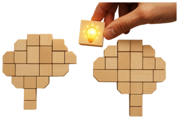 Hand adding a lightbulb block to a wooden brain puzzle, symbolizing the creation of a new idea within a mind isolated on a transparent background