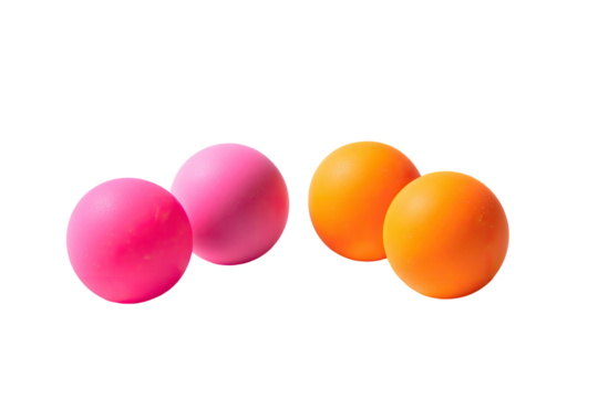 Pink & orange spheres resting. Isolated on black ground