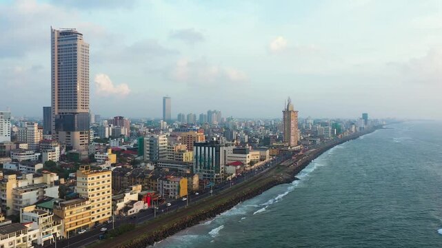 Colombo city with buildings and streets at sunset. Sri Lanka.