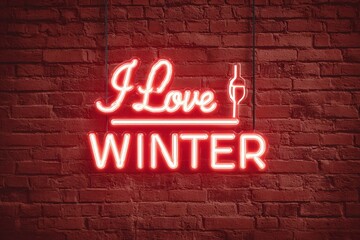 Fototapeta premium Neon sign says i love winter on a brick wall