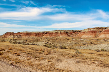 Red and Orange Layered Badlands at Red Gulch-Alkali National Back Country Byway in North Central Wyoming.