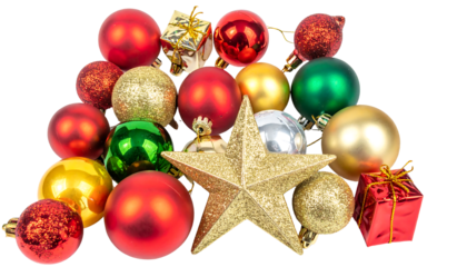 A pile of christmas ornaments including red, gold, green, and silver balls, plus a gold star, isolated cutout