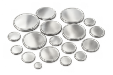 Group of small, round, silver button cell batteries used for providing power to watches, calculators, and other electronics