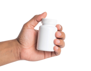 Hand holding white medicine bottle mockup supplement container on transparent background