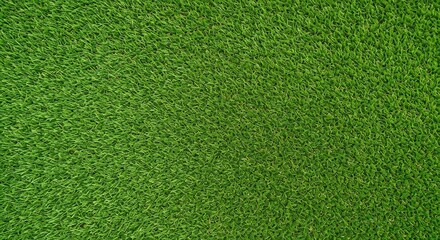 Green artificial grass blades create a dense uniform textured surface