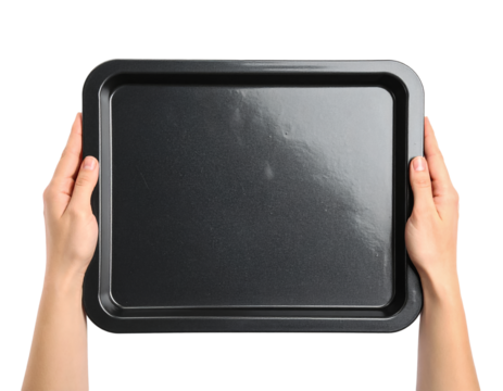Hands holding empty black baking sheet oven tray kitchenware on transparent background