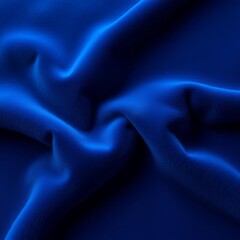 Soft velvet pile in a deep navy blue, creating a rich and tactile surface with subtle light reflection,  texture,  fabric