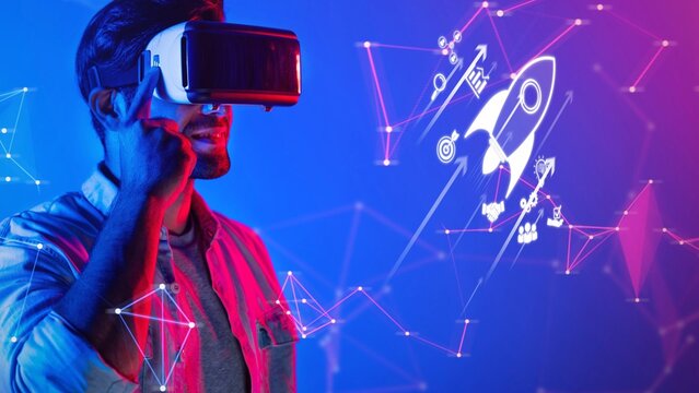 A young man engages with a virtual reality headset, exploring a vibrant digital landscape filled with futuristic graphics and creative possibilities. Raster - Powered by Adobe
