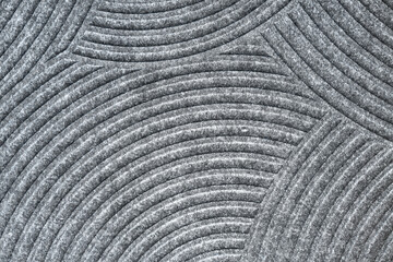 Geometric pattern carpet texture. Felt carpet close-up
