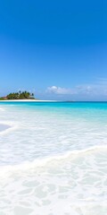 Fototapeta premium Turquoise ocean waves gently lapping on a white sandy beach with palm trees in the distance, shoreline, white