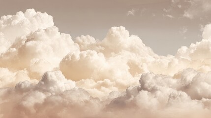 Fluffy clouds fill the sky during sunset showcasing soft hues of orange and pink. The tranquil atmosphere invites calmness and wonder in nature's beauty.