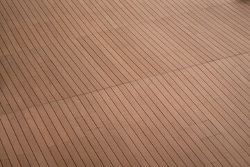 Wooden floor with diagonal lines, perfect for backgrounds and textures