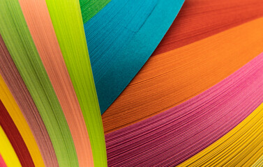 Countless paper stacks, soft curves, colorful hues, various shapes, strong textures, much like ribbons, silk, or lollipops, with ribbons flowing around. fresh