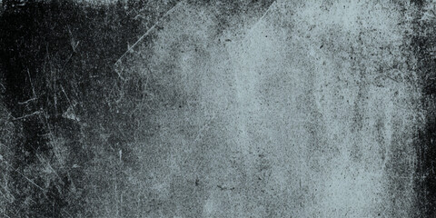 Abstract dark grunge texture with black and gray concrete wall and vignette effect details including scratches, cracks, peeling paint effects, dust particles.