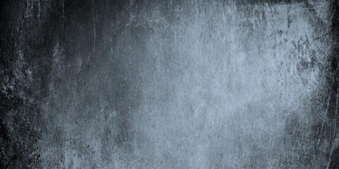 Abstract dark grunge texture with black and gray concrete wall and vignette effect details including scratches, cracks, peeling paint effects, dust particles.