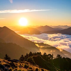 Fototapeta premium A vibrant sunrise over majestic mountain ranges, with clouds nestled in the valleys, creating a stunning scenic view