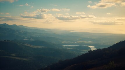 A cinematic photo of a serene and picturesque landscape featuring rolling hills, majestic mountains, lush green forests, and sparkling water bodies beneath a vast open sky