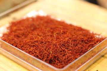 Premium saffron zafran threads red spice showing luxury kesar natural golden spice closeup