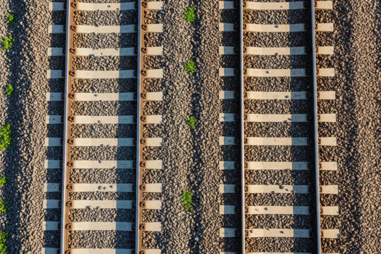 Top down view of two parallel railway tracks