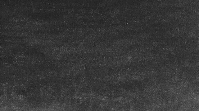 Grunge Paper Texture Loop. A distressed, black and white animation of flickering old documents and text.4k loop stop motion video