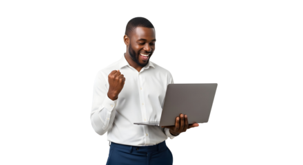 Excited young African American man celebrating success holding laptop with fist pump expressing joy and achievement business professional happily receiving good news online