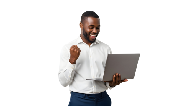 Excited young African American man celebrating success holding laptop with fist pump expressing joy and achievement business professional happily receiving good news online