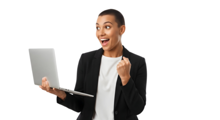 Excited young businesswoman with a buzz cut haircut celebrating online success holding a laptop and making a fist expressing joy and triumph from digital achievements