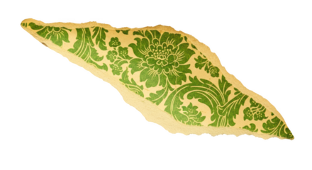 Torn antique paper fragment with green floral damask pattern isolated on a transparent background image