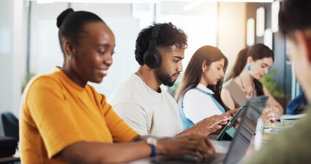 Obraz premium Classroom, university and students on tech for learning, studying and education at college. School, academy and people on tablet for research, website and internet for project, lesson and assignment