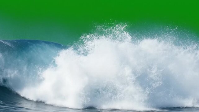 Powerful ocean wave crashing against a green screen backdrop offering creative possibilities for visual effects and compositing projects