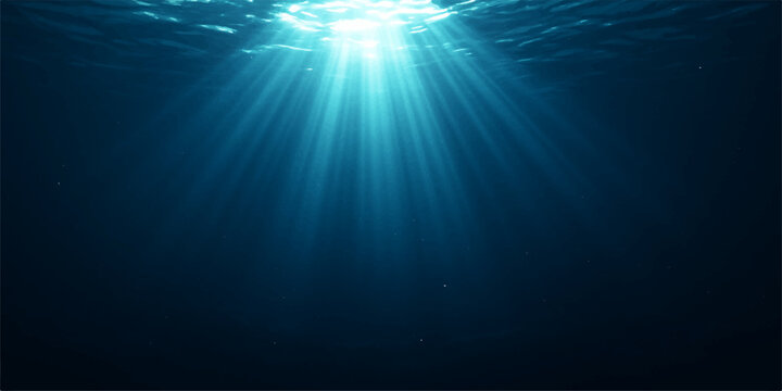 Deep blue ocean background loop with bright sun rays bursting through the water
