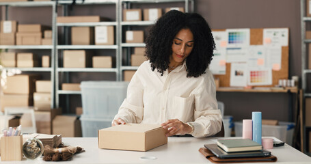 Woman, packing and logistics with box for small business distribution, online order or packaging....