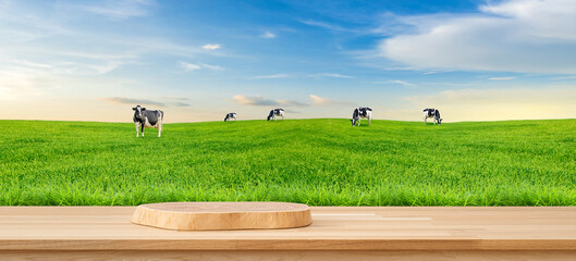 Wooden Stand with Cows: Wooden stand offers a clear space for your product in the scene, while Cows grazing happily in a lush, green pasture under a bright blue sky, the scene radiates serenity.