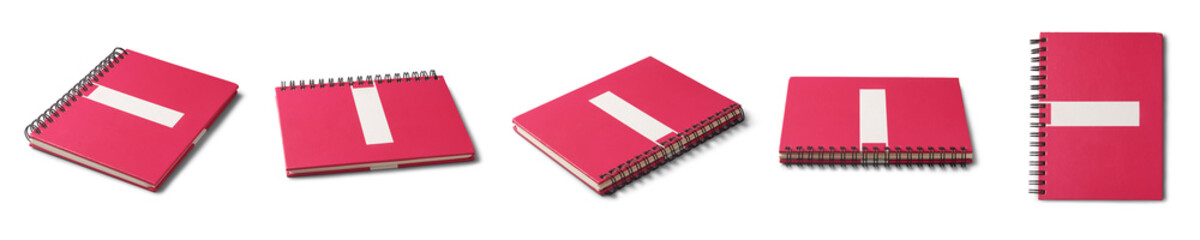 set of closed spiral notebook with textured red cover and blank white label for branding isolated...